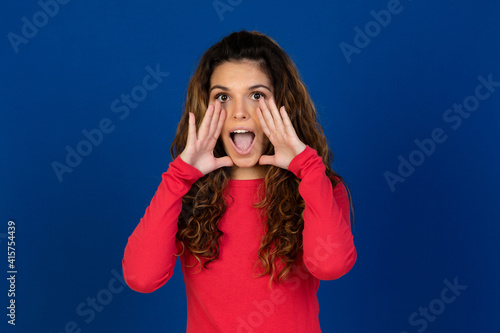 Portrait of beautiful caucasian girl with curly hair