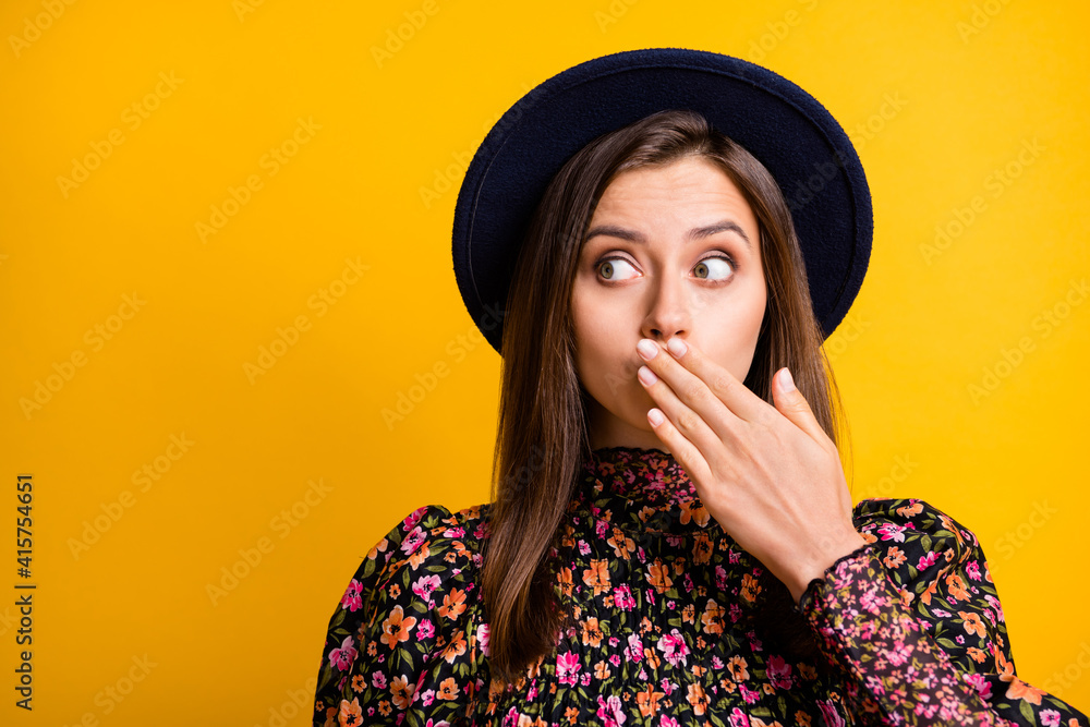 Portrait of terrified person arm cover mouth look empty space headwear retro outfit isolate don yellow color background Portrait of terrified person arm cover mouth look empty space headwear retro outfit isolate don yellow color background
