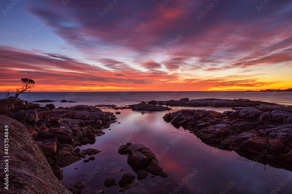 Beautiful , autumn, sunrise over Binalong Bay. Bay of Fires Conservation Area. North Eastern Tasmania, Australia.