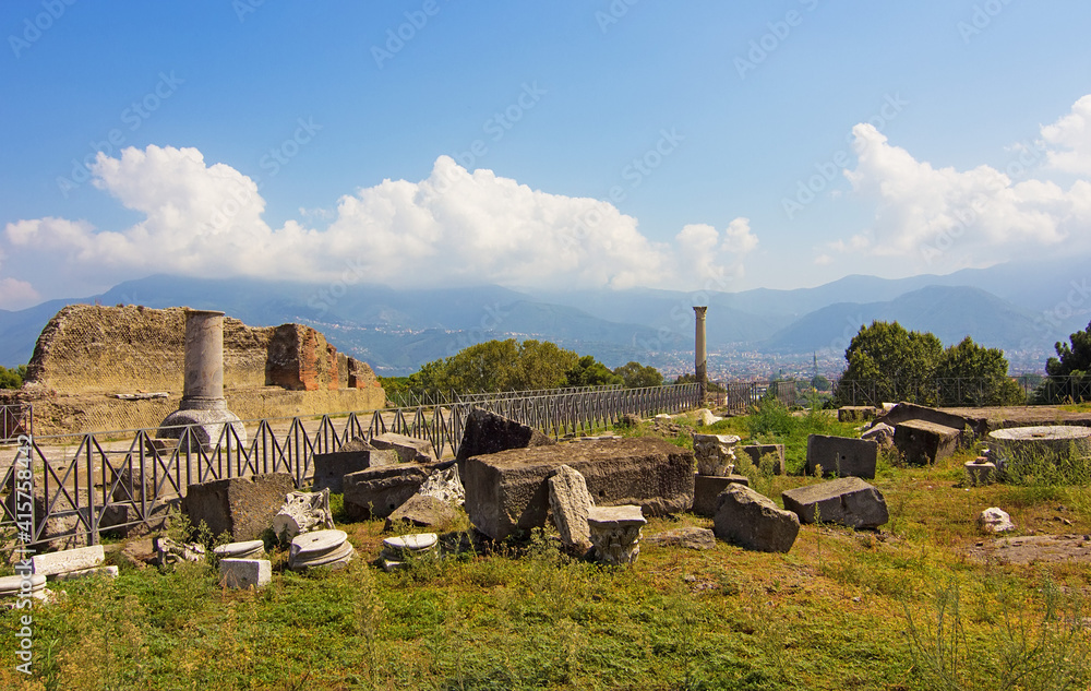 Panoramic view of the ancient city of Pompeii with houses and streets. Ruins of Ancient Roman city in Pompei, Campania, Italy buried under ashes after eruption of Vesuvius.