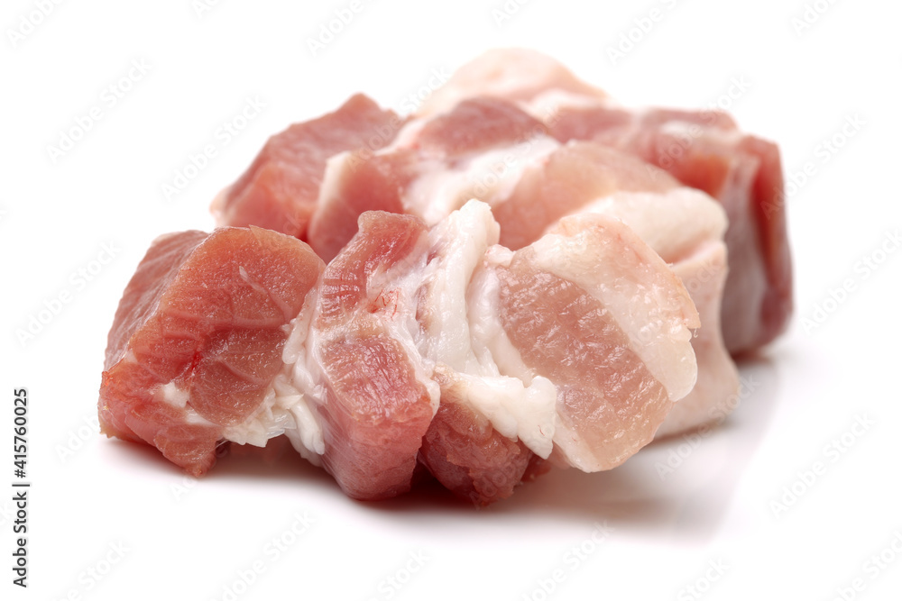 Raw pork belly pieces on a white background Raw pork belly pieces on a white background