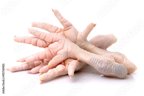 Chicken feet on white background.