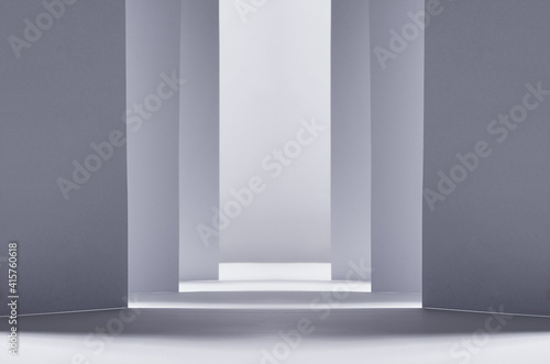 Abstract white grey background with geometric channel of stripes with perspective as scene or street, copy space. photo