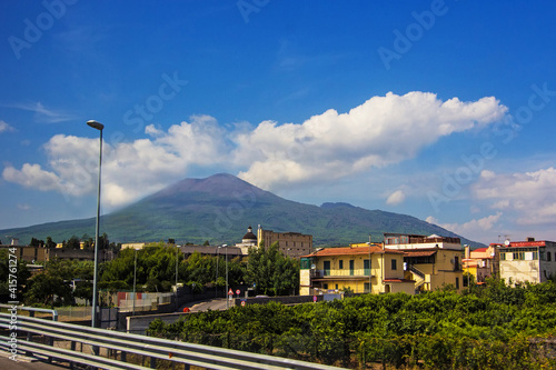 Amazing view of Mount Vesuvius on the road from Naples to Pompeii. Campania, southern Italy. The active cone is the high peak on the left side. Soft selective focus, long exposure