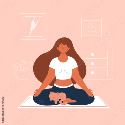 Woman doing meditation with her cute cat