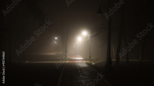 lantern lights on the red alley in the fog