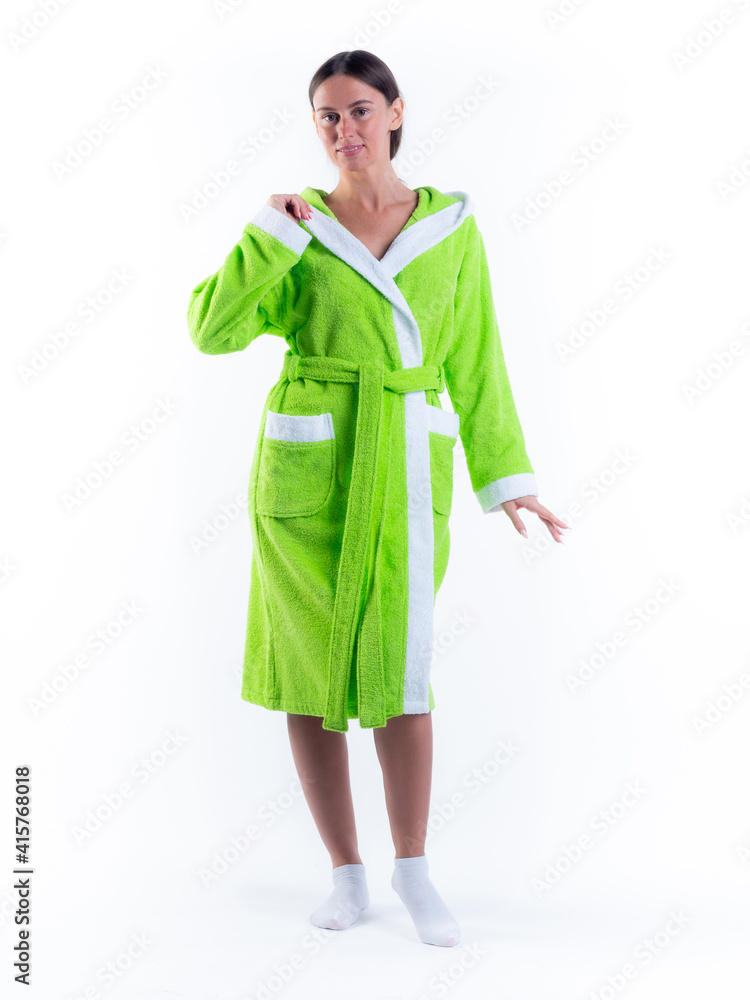woman in a Bathrobe on an isolated white background with a smile on her face. woman in a Bathrobe on an isolated white background with a smile on her face.