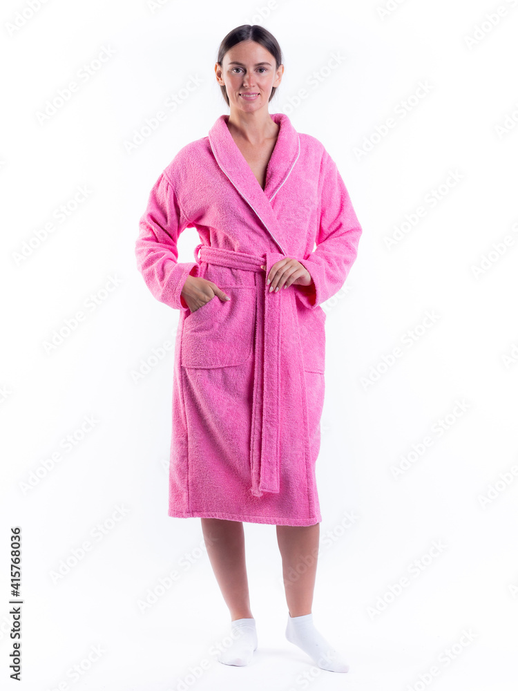 woman in a Bathrobe on an isolated white background with a smile on her face. woman in a Bathrobe on an isolated white background with a smile on her face.