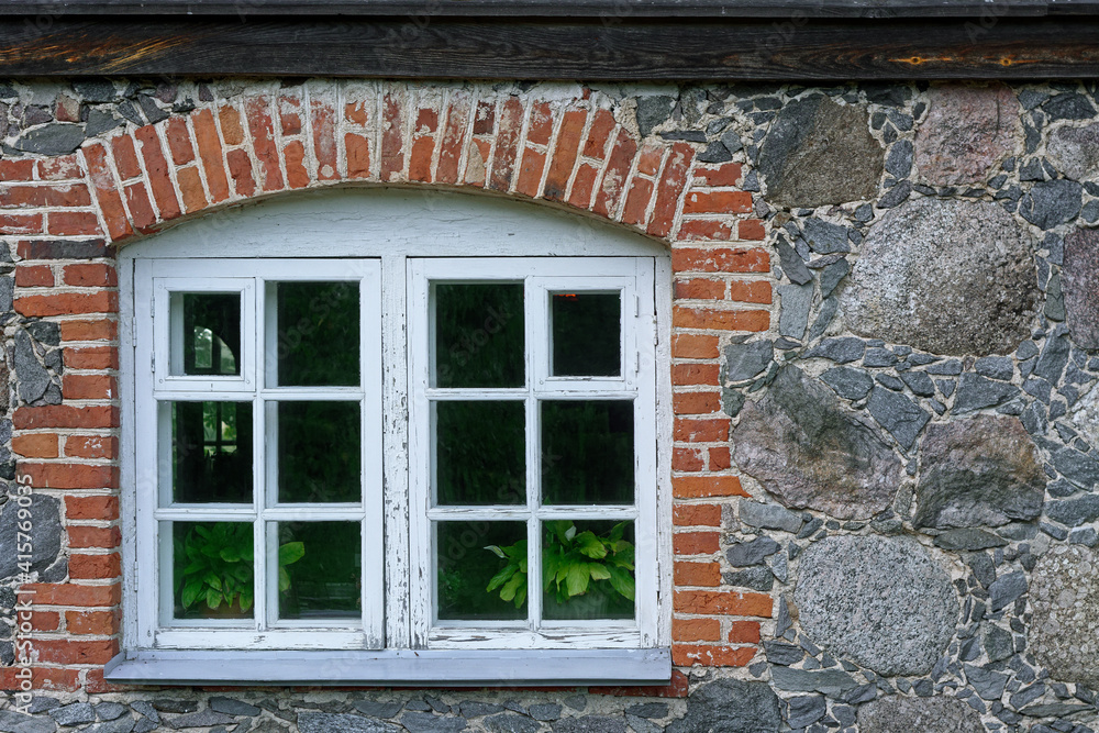 Fototapeta premium Old arched window.
