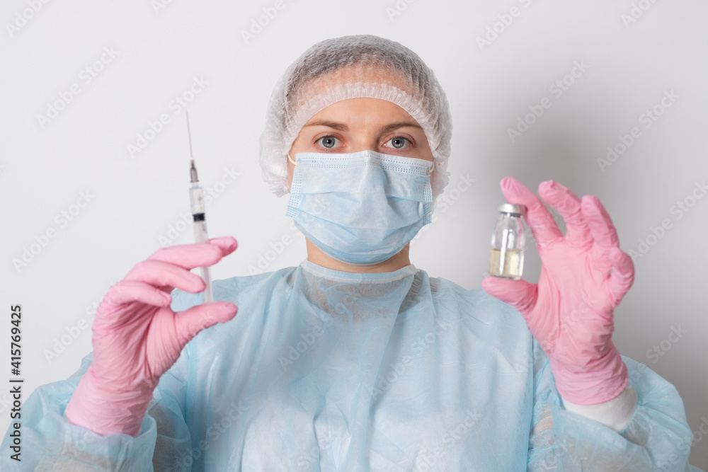 Female doctor, nurse hand in medical gloves holding flu, measles, coronavirus, covid-19 vaccine. Medicine concept. Female doctor, nurse hand in medical gloves holding flu, measles, coronavirus, covid-19 vaccine. Medicine concept.