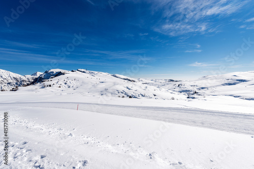 Peak of Malga San Giorgio, Ski Resort in winter with snow. Altopiano della Lessinia (Lessinia Plateau), Regional Natural Park, Verona province, Veneto, Italy, Europe. On the left the Monte Carega.