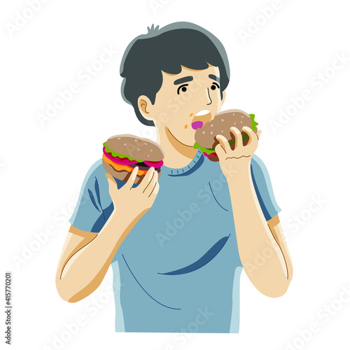 young boy eating junk food 