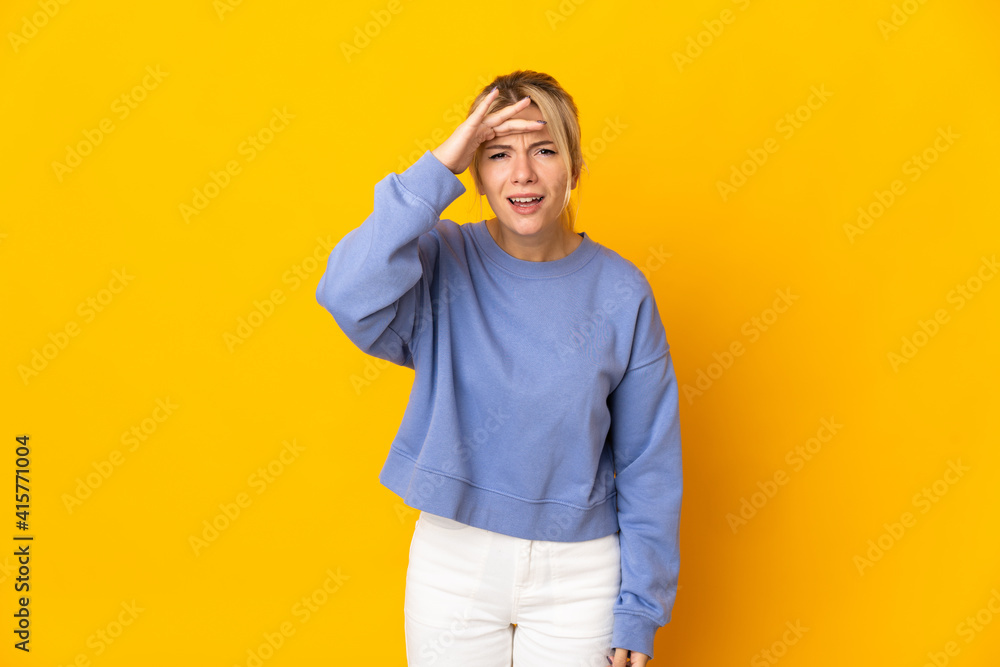 Young Russian woman isolated on yellow background looking far away with hand to look something Young Russian woman isolated on yellow background looking far away with hand to look something