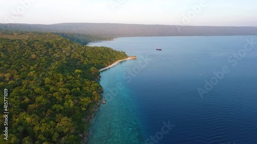 aerial seascape coastline of tropical paradise moyo island sumbawa indonesia Gorgeous blue water white sand beaches, travel destination tropical landscape during hot day of summer photo