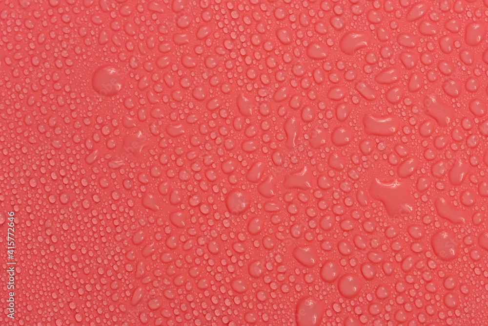 Water drops on red background texture. backdrop glass covered with drops of water. bubbles in water Water drops on red background texture. backdrop glass covered with drops of water. bubbles in water