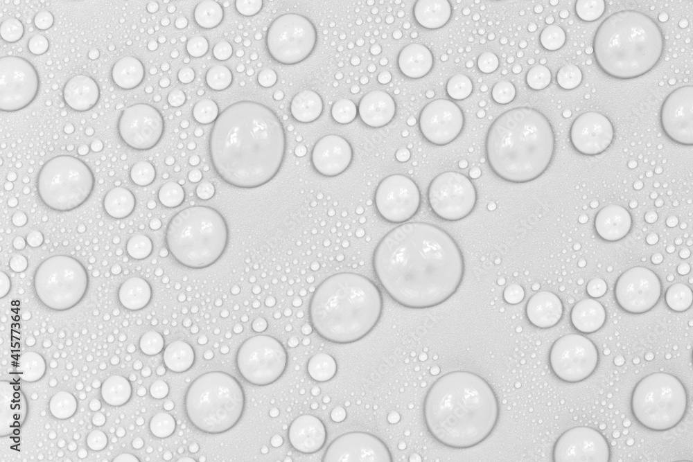 Water drops on white background texture. backdrop glass covered with drops of water. bubbles in water Water drops on white background texture. backdrop glass covered with drops of water. bubbles in water