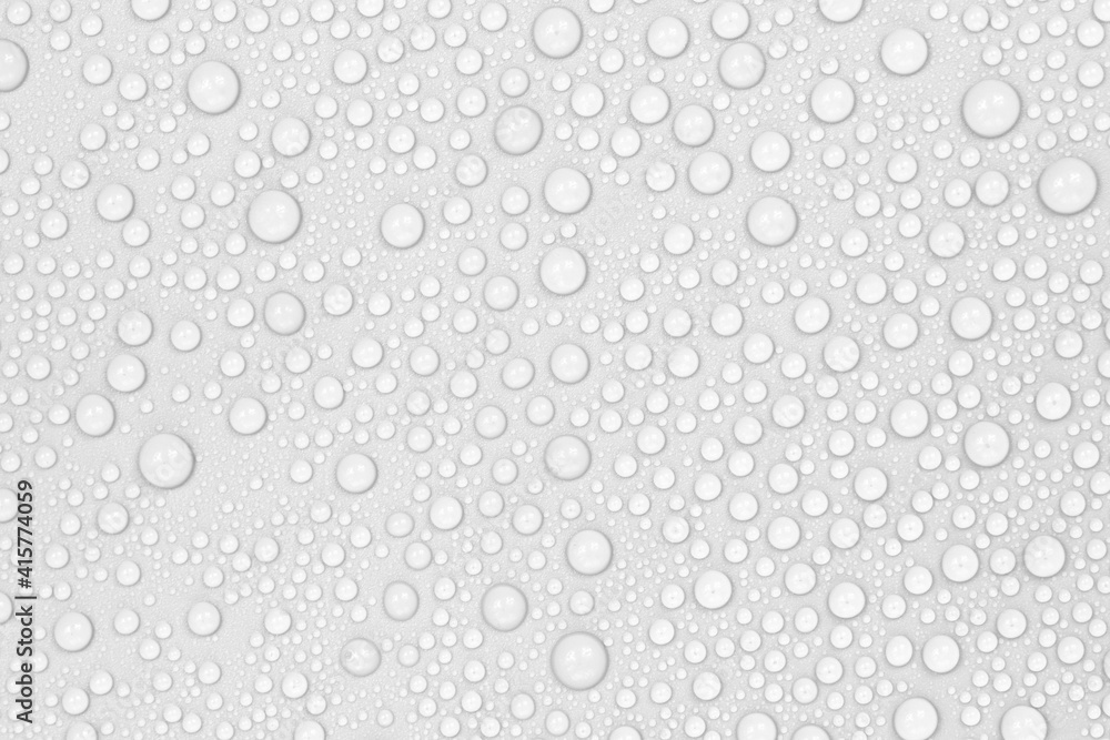 Water drops on white background texture. backdrop glass covered with drops of water.  bubbles in water