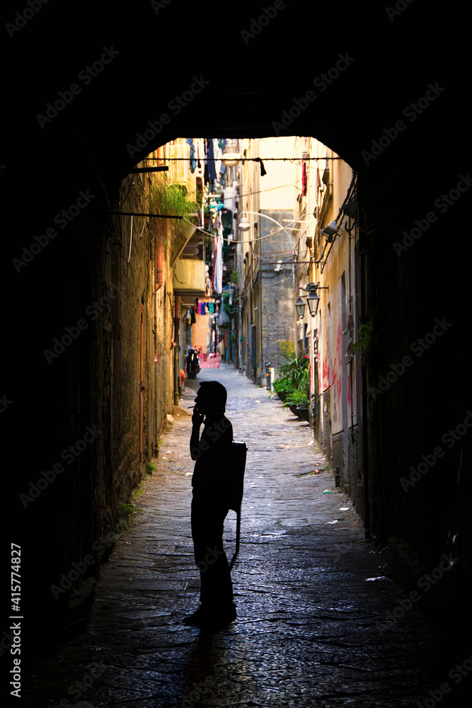 Silhouette of Smoking Guitar Player, Naples, Italy Silhouette of Smoking Guitar Player, Naples, Italy
