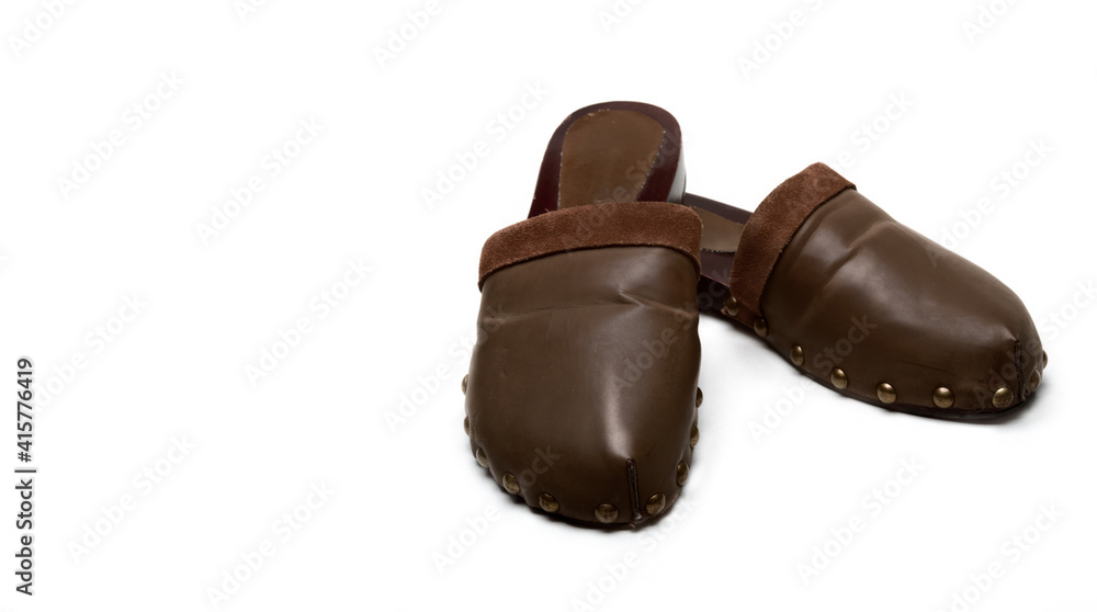A beautiful modern woman dutch clogs wooden shoe like. Copy space A beautiful modern woman dutch clogs wooden shoe like. Copy space