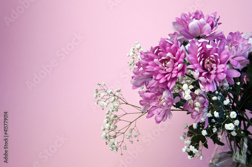 colorful bouquet of pink chrysanthemums and gypsophila