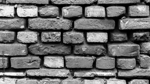 old brick wall in motion, black and white brick wall texture