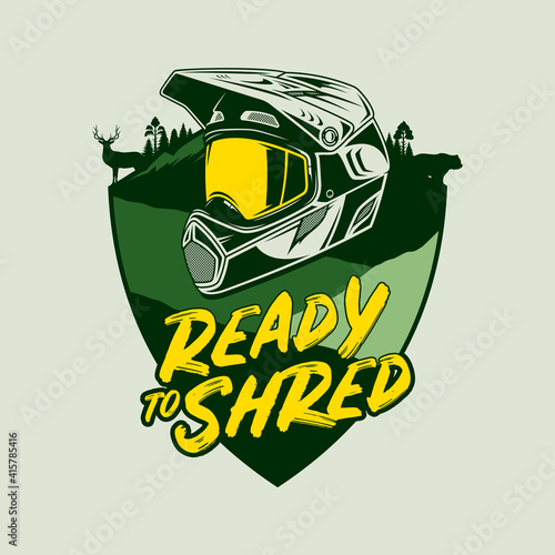 Vector mountain biking badge with full-face helmet and mountain silhouette