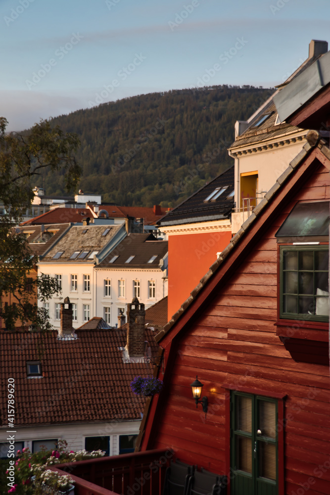 A beautiful cityscape view of colorful traditional houses with tiled roof in Bergen, Norway.