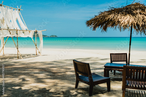 Table and chair at tropical summer beach. © ant
