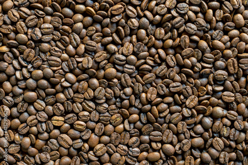 Background of fresh roasted coffee beans.