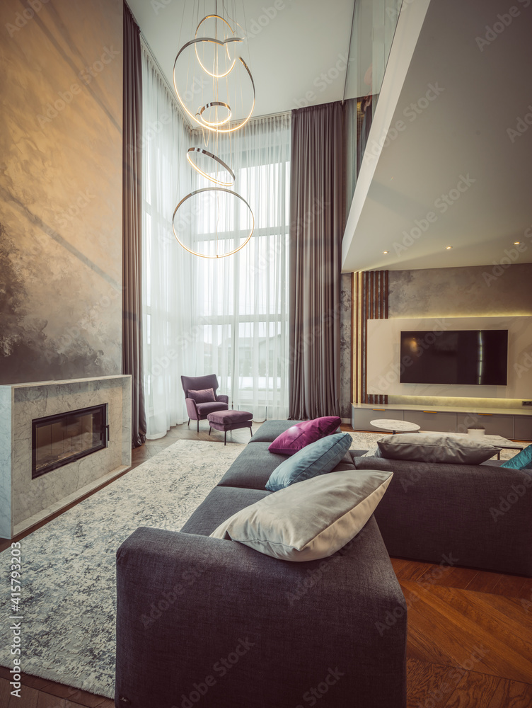 Fototapeta premium Luxury interior of flat. Living room with huge sofa. Modern design.