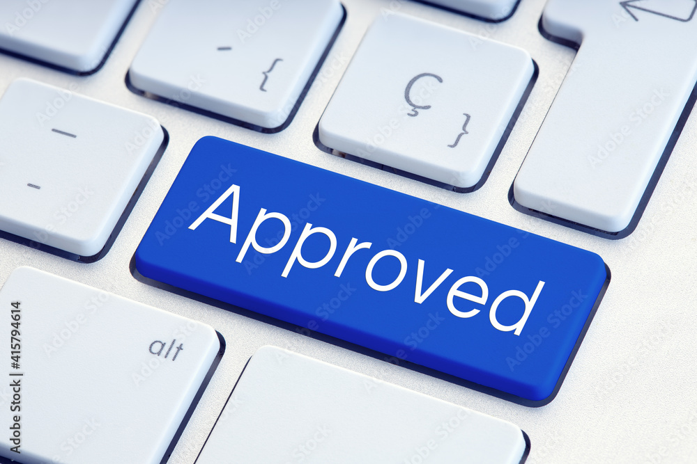 Approved Word on blue computer Keyboard Key Approved Word on blue computer Keyboard Key