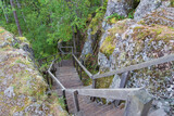 wooden stairs along the rocks