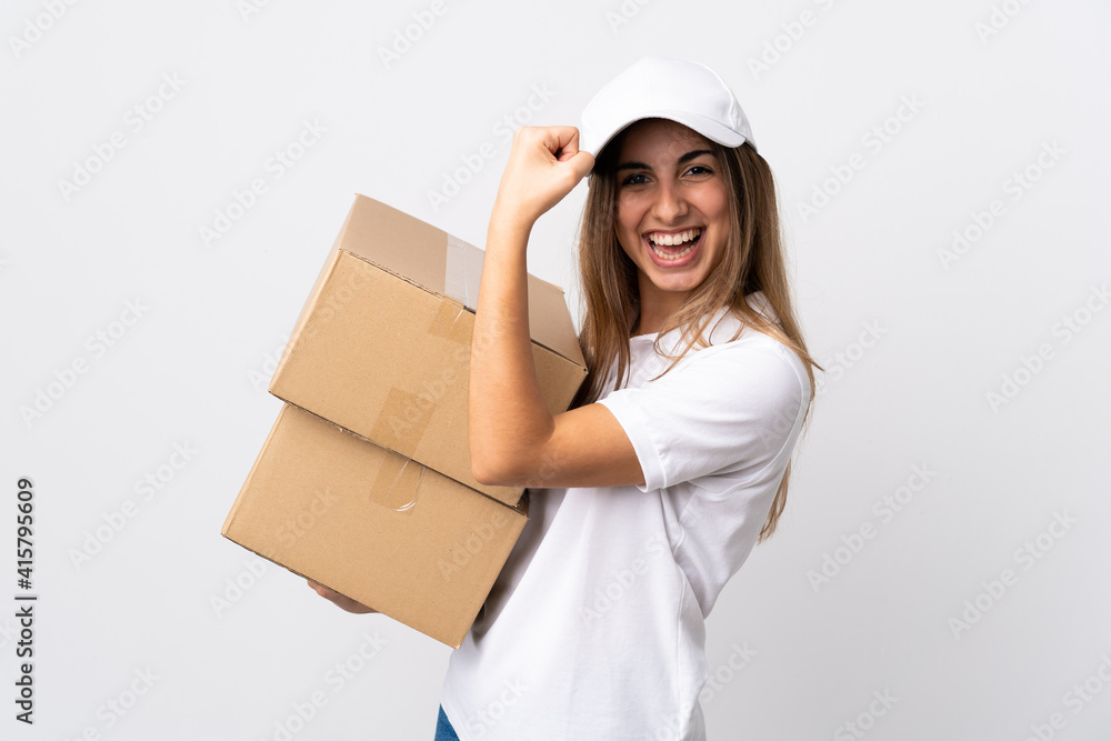 Young delivery woman over isolated white background celebrating a victory Young delivery woman over isolated white background celebrating a victory