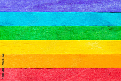 Multi color wood plank use as textured background, frame, decoration with copy space (Concept for rainbow or LGBT)