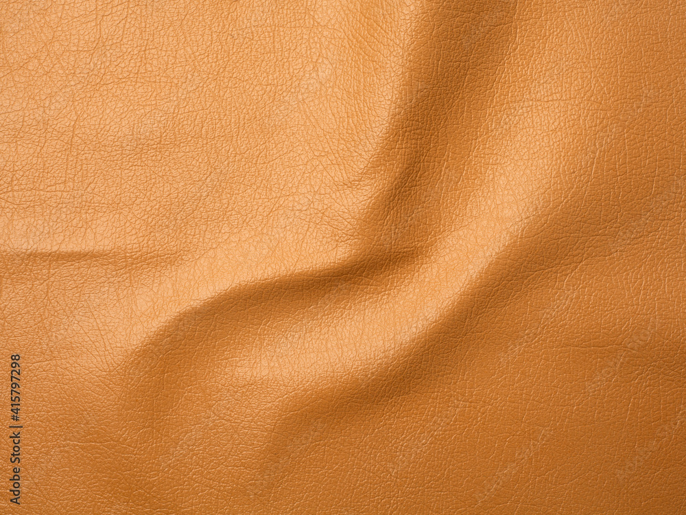 Orange cattle leather texture background Orange cattle leather texture background