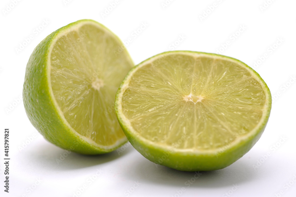 tropical citrus lime fruit in detail on white background tropical citrus lime fruit in detail on white background
