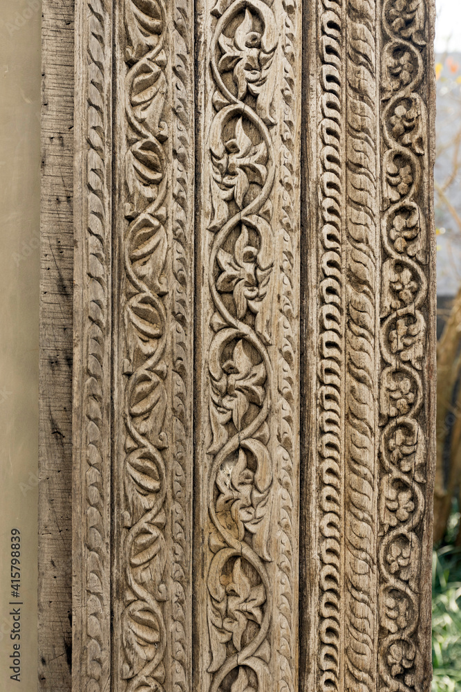 Wood frame and carving floral ornament. Decorative carved on wooden surface. 