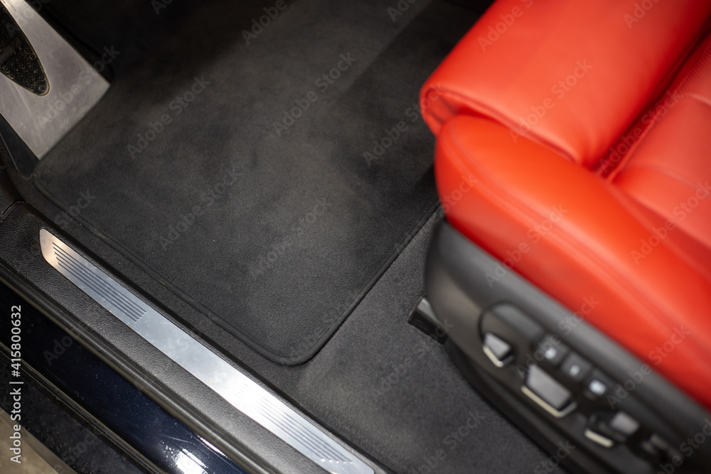 Obraz premium Car detailing series: interior of a luxury car. red seats