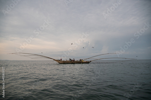 Fishermen in a typical boat in Lake Kivu, Rwanda,