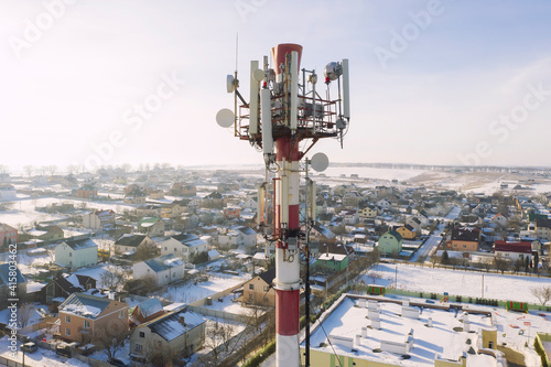 Telecommunication tower of 4G and 5G cellular. Base Station or Base Transceiver Station. Wireless Communication Antenna Transmitter. Telecommunication tower with antennas against blue sky.