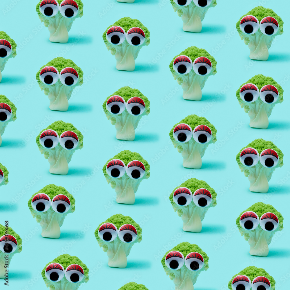 mosaic of broccoli heads with googly eyes