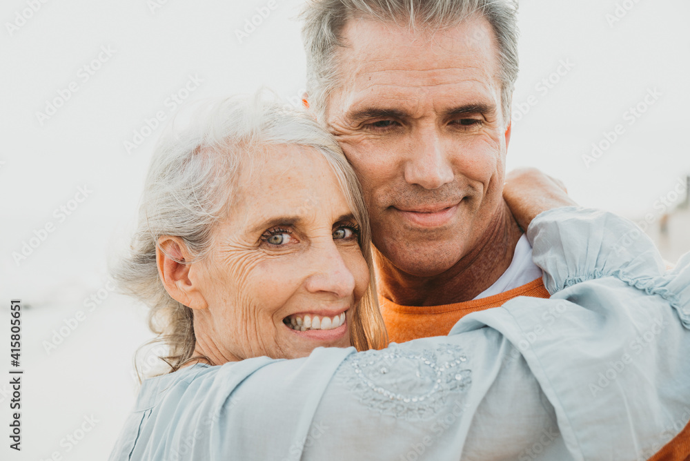 Happy senior couple spending time at the beach. Concepts about love,seniority and people Happy senior couple spending time at the beach. Concepts about love,seniority and people