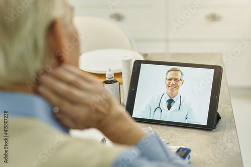 Senior citizen getting hold of his physician online