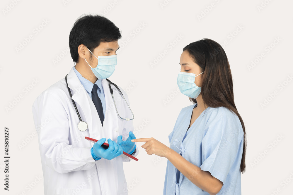 Isolated of portrait male doctor and female patient with tablet on white background. Isolated of portrait male doctor and female patient with tablet on white background.
