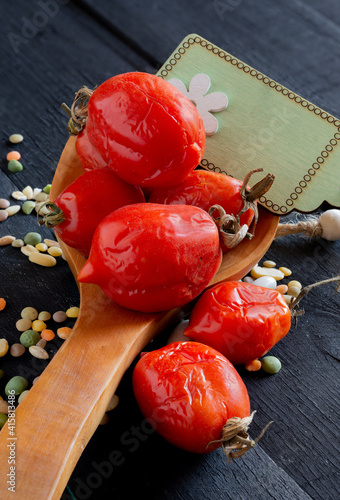 small tomatoes typical of the cultivation of the Neapolitan territory on the slopes of Vesuvius called Piennolo tomatoes photo