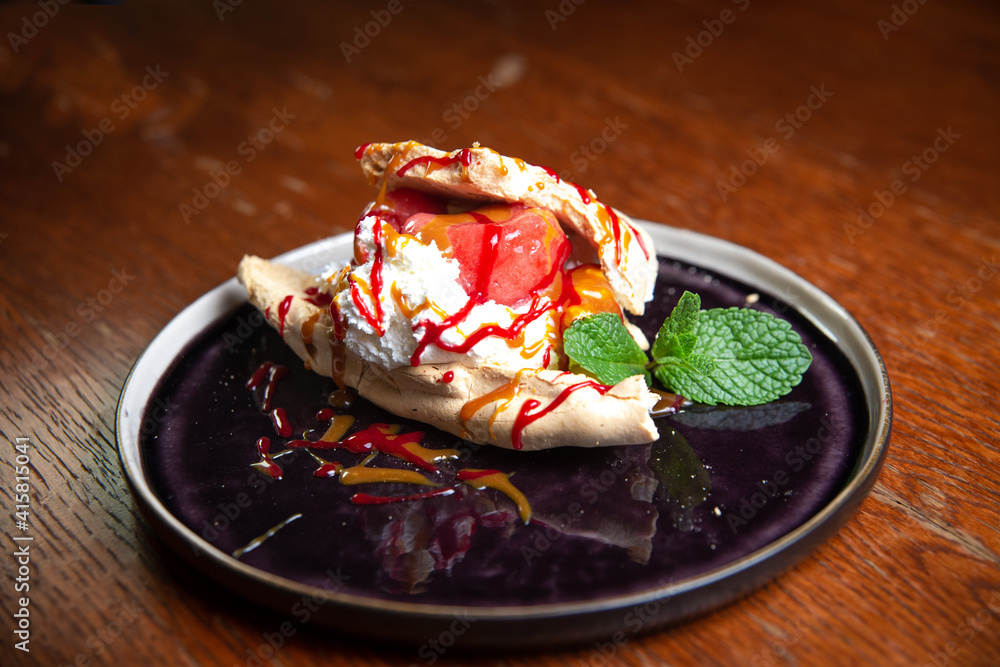 Apple strudel with a scoop of ice cream and mint Apple strudel with a scoop of ice cream and mint
