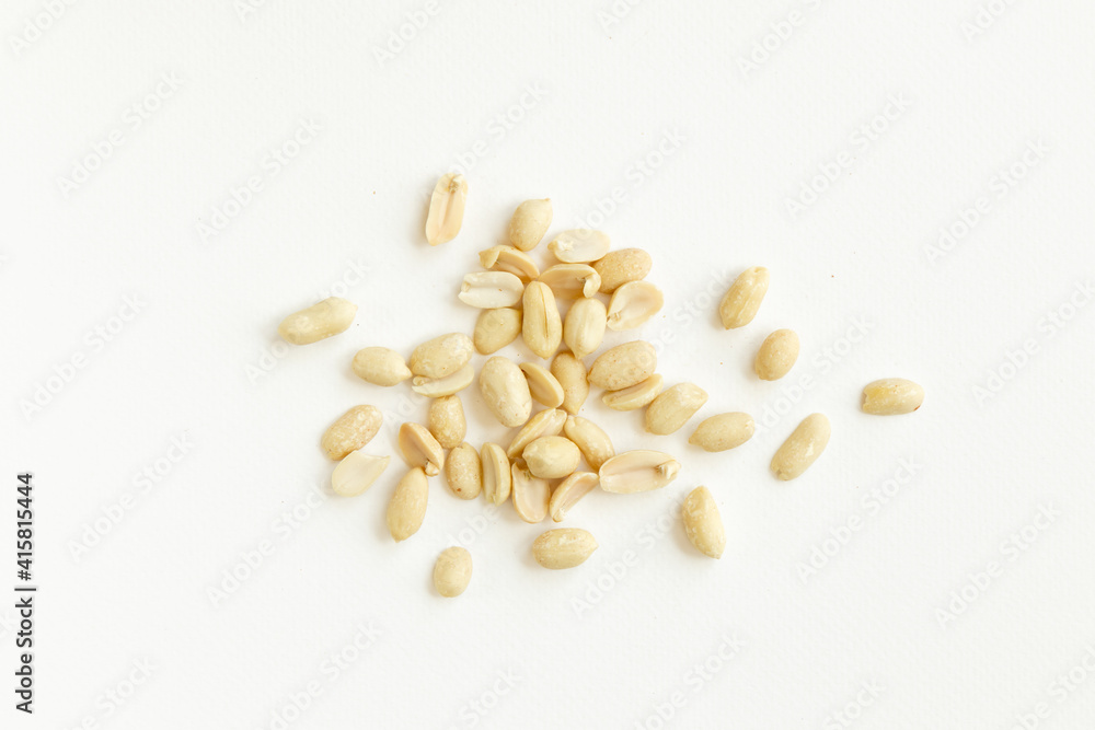 Group of peeled peanuts isolated on a white background. Group of peeled peanuts isolated on a white background.