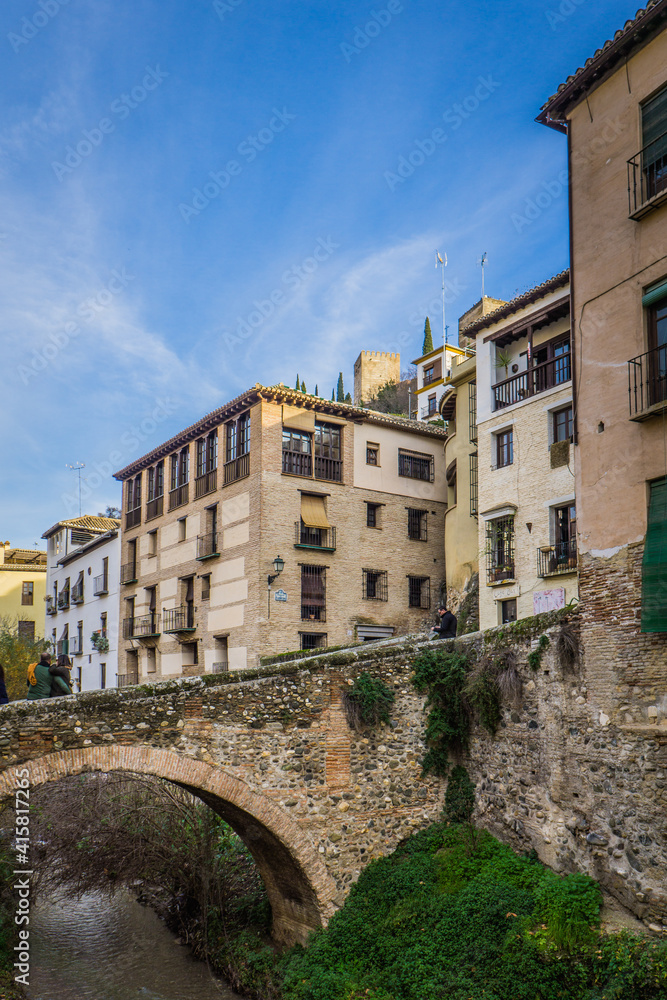Carrera del Darro, one of the most beautiful street of Granada (Andalusia, Spain), right at the feet of the Alhambra complex.