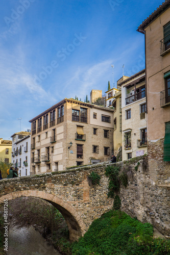 Carrera del Darro, one of the most beautiful street of Granada (Andalusia, Spain), right at the feet of the Alhambra complex.