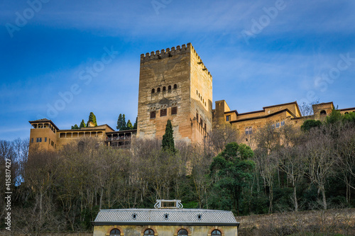 View from below on the Alcazaba, the medieval fortress part of the Alhambra complex in Granada, Andalusia, Spain
